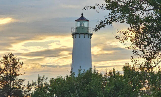 east tawas lighthouse at dusk